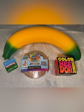 1 NeeDoh Color Change Ball, 1 Glitter Dumpling & 1 Banana Squishy Fidget Toy